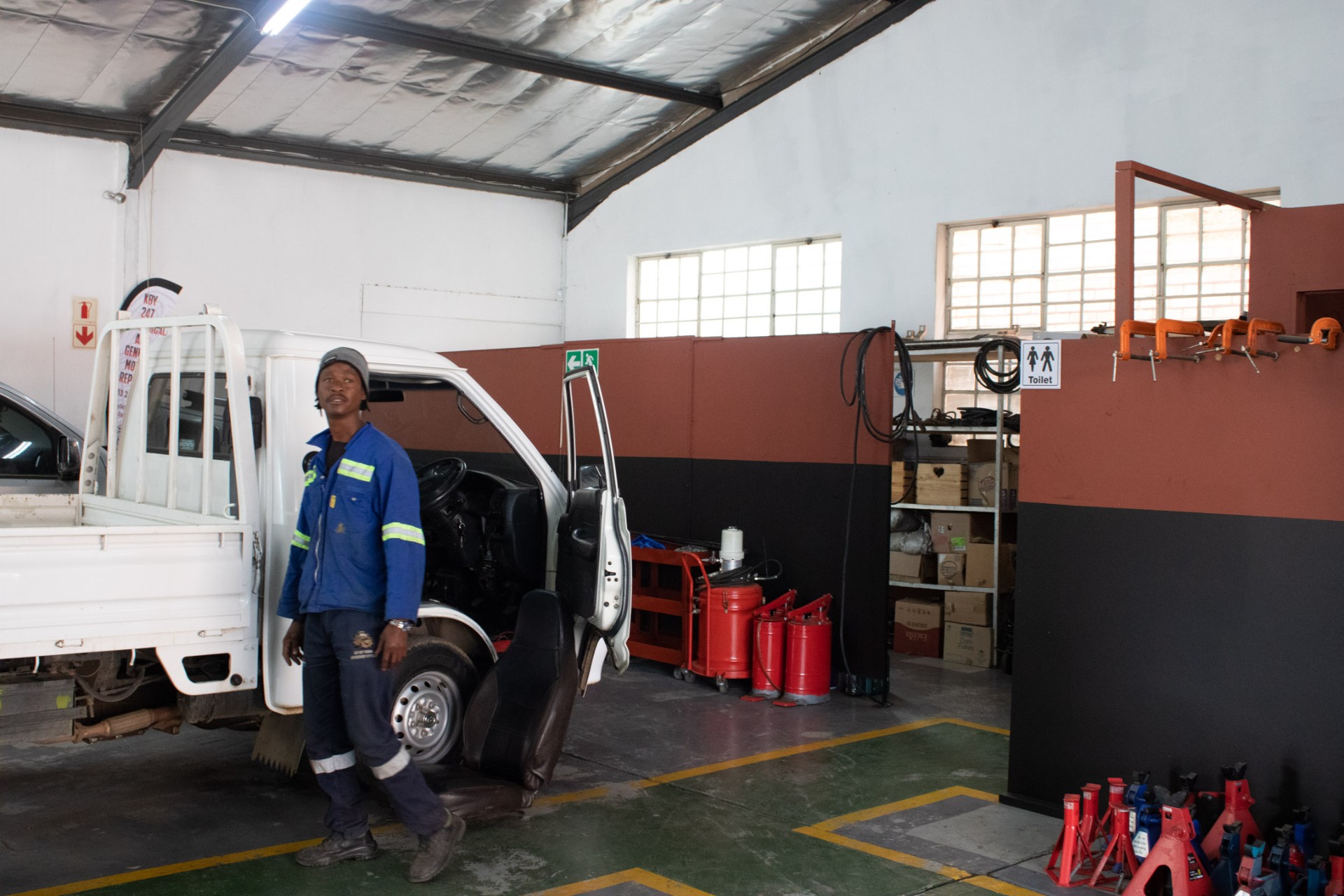 Inside the KBY 247 workshop — a bakkie being serviced on the workshop floor