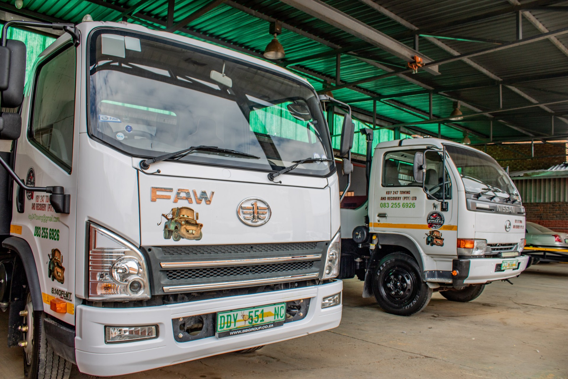 KBY 247 tow trucks parked at the Kimberley workshop